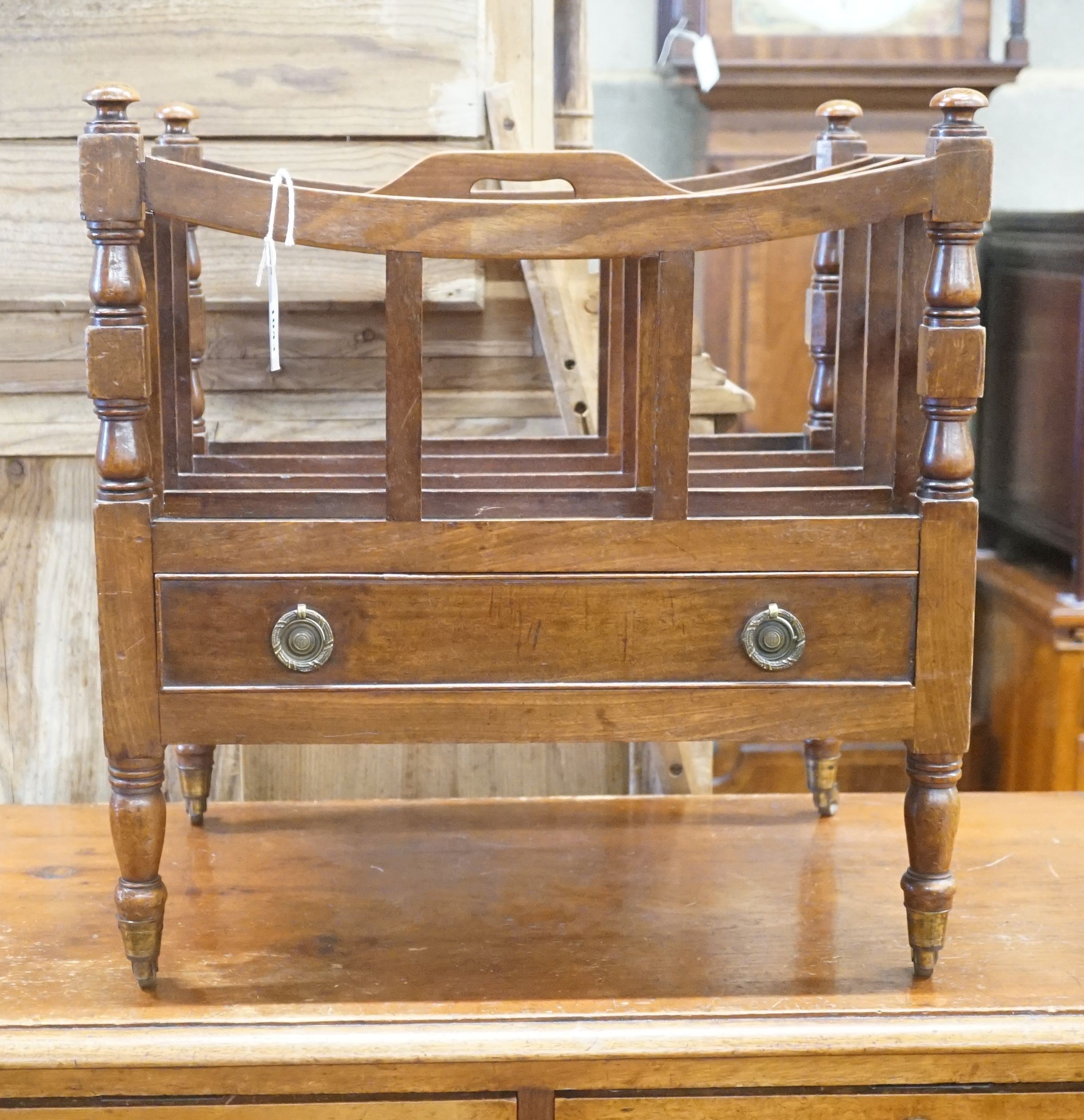 A Regency style mahogany four division Canterbury with single drawer, width 50cm depth 36cm height 53cm